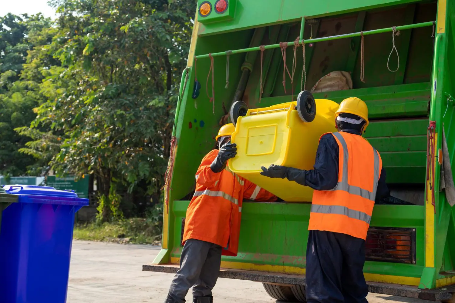 garbage-collector-two-garbage-men-working-together-emptying-dustbins-trash-removal-with-truck-loading-waste-trash-bin